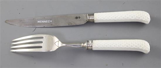 A Saint Cloud or Mennecy white glazed porcelain pistol handled knife and fork, c.1740-60, 21cm and 22.5cm